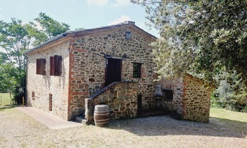 stone farmhouse with swimming pool